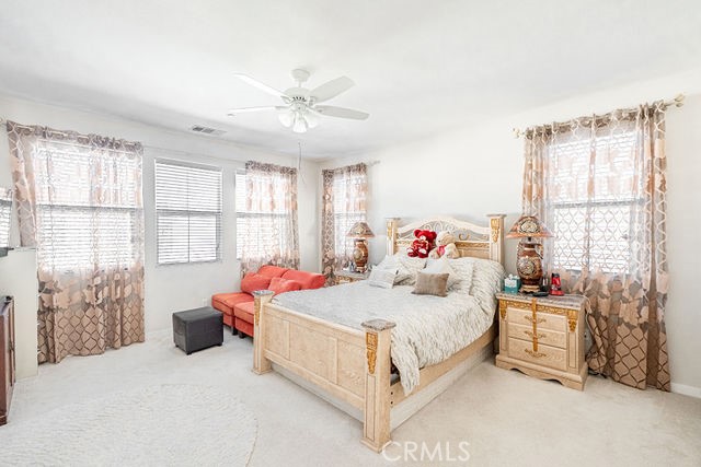 39580 Strada Pozzo Lake Elsinore, CA 92532 - Photo 46 of 67 a bedroom with a bed and a window