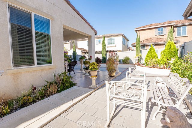 39580 Strada Pozzo Lake Elsinore, CA 92532 - Photo 54 of 67 a view of an outdoor space with a patio