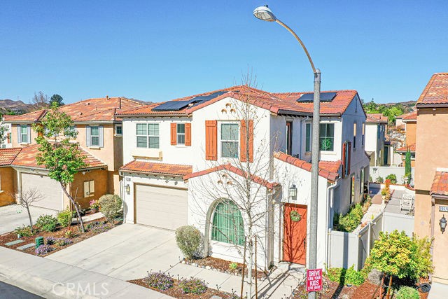 39580 Strada Pozzo Lake Elsinore, CA 92532 - Photo 59 of 67 a front view of a house with a porch
