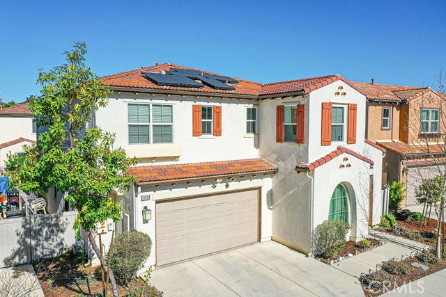 39580 Strada Pozzo Lake Elsinore, CA 92532 - Photo 60 of 67 a front view of a house with a yard