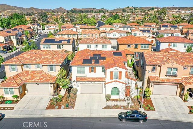 39580 Strada Pozzo Lake Elsinore, CA 92532 - Photo 62 of 67 an aerial view of residential houses with outdoor space and parking