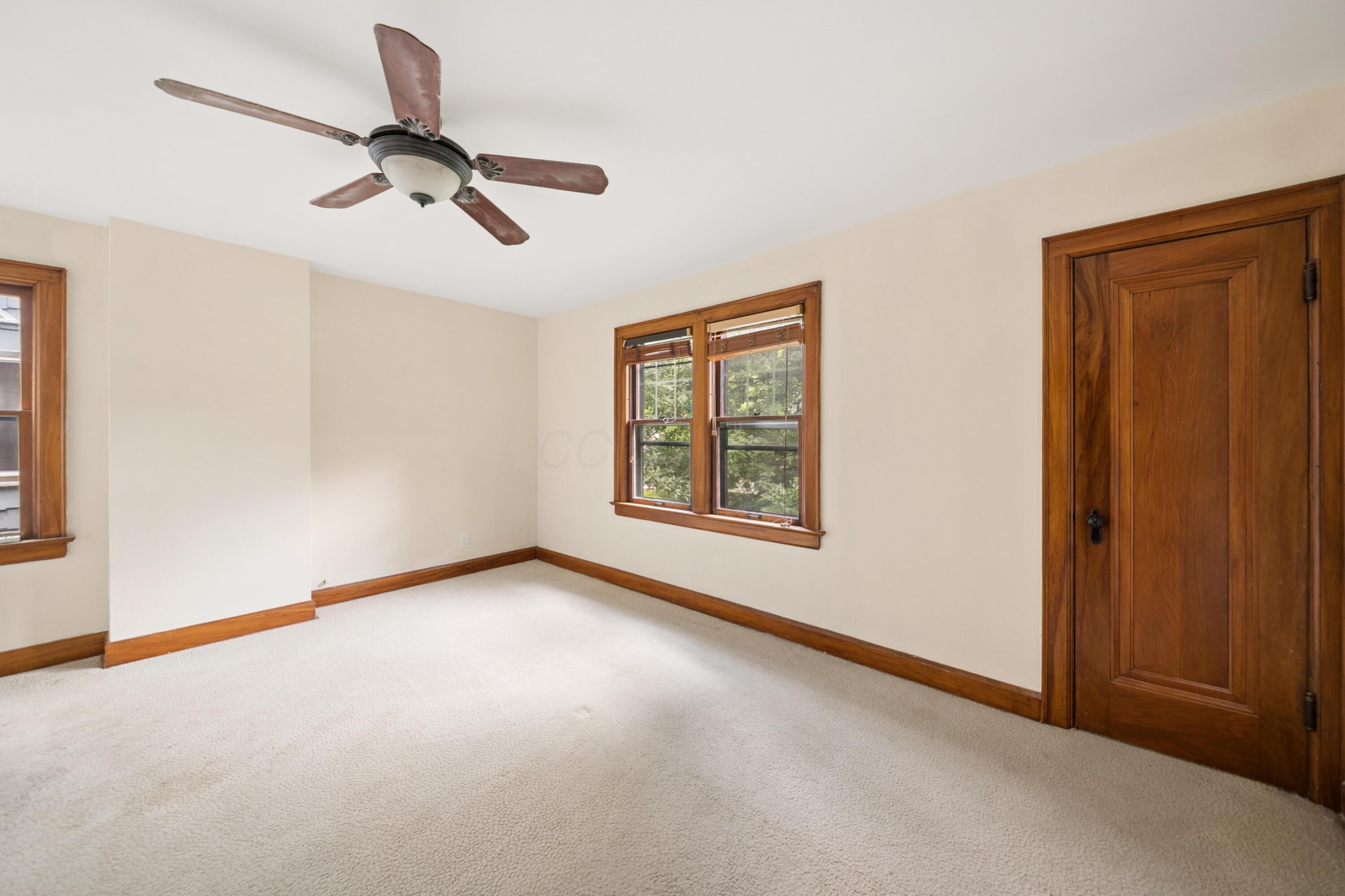 393 Mimring Road Columbus, OH 43202 - Photo 39 of 55 Bedroom 3, large bedroom with big closet and lots of light. wood floors under carpet