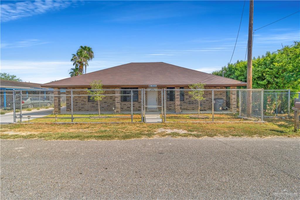 a view of a house with a swimming pool