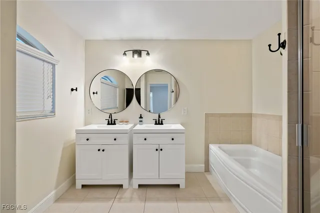 a bathroom with a toilet sink