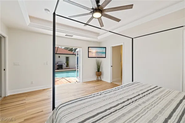 a view of a patio with a table and chairs