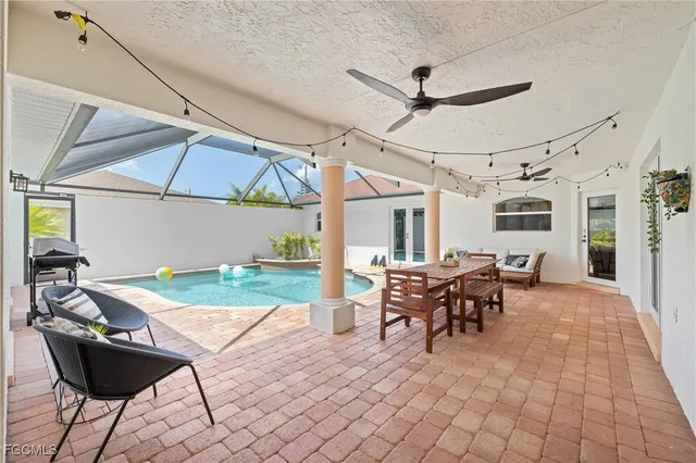 a view of an entryway with wooden floor and a rug