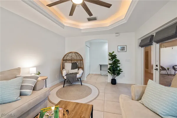 a kitchen with stainless steel appliances kitchen island granite countertop a refrigerator and a stove top oven