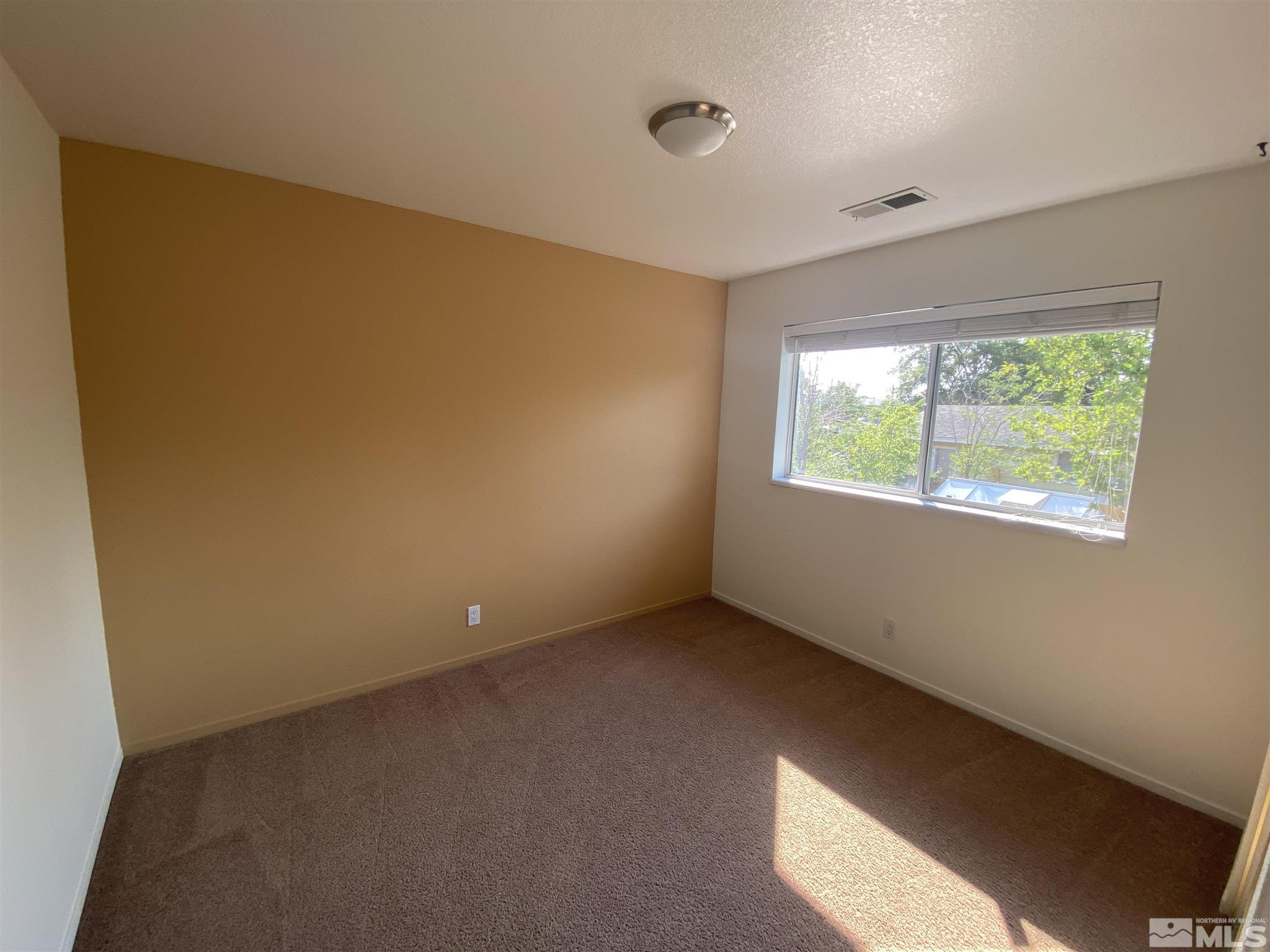 3380 Adler Court Reno, NV 89503 - Photo 14 of 30 a view of an empty room with a window