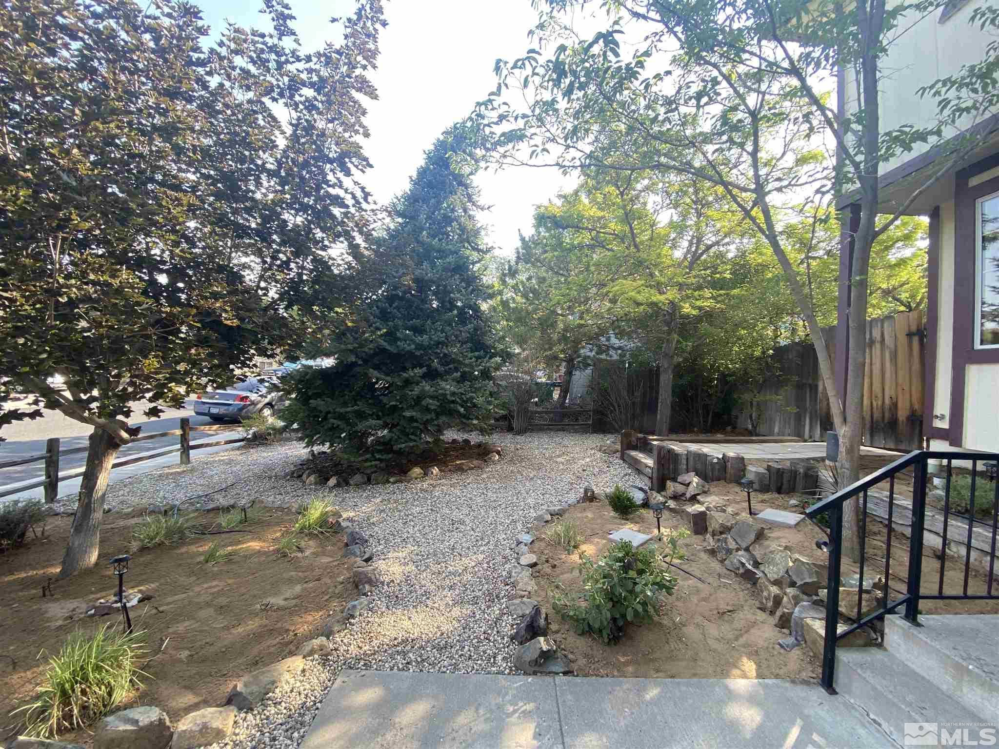 3380 Adler Court Reno, NV 89503 - Photo 21 of 30 a backyard of a house with table and chairs