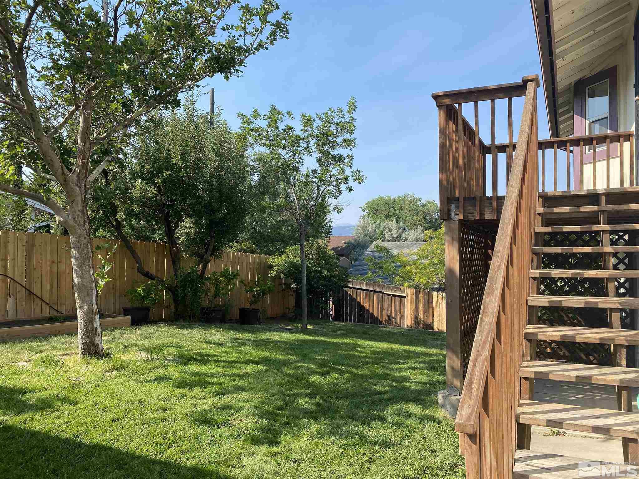 3380 Adler Court Reno, NV 89503 - Photo 23 of 30 front view of a house with a yard