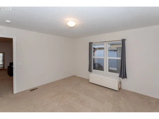 an empty room with cabinet