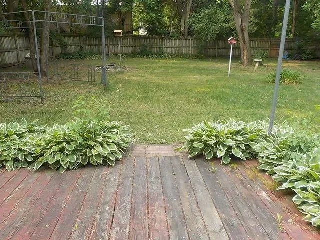 a swimming pool with outdoor seating