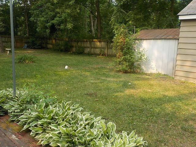2125 Windsor Road Loves Park, IL 61111 - Photo 5 of 12 a view of a backyard