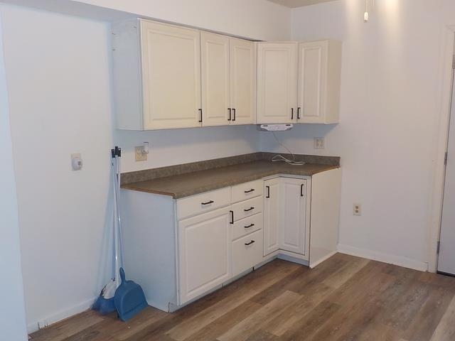 2125 Windsor Road Loves Park, IL 61111 - Photo 7 of 12 a kitchen with granite countertop white cabinets and white appliances