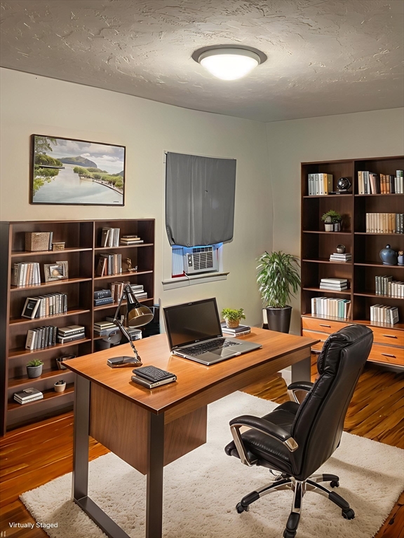 a view of a workspace with furniture