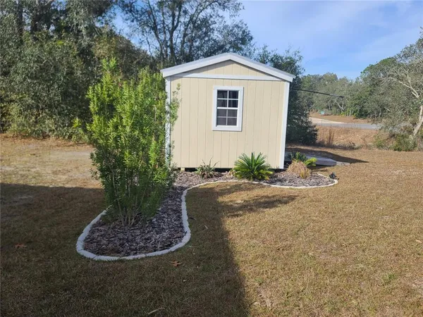 a view of a house with a wooden door
