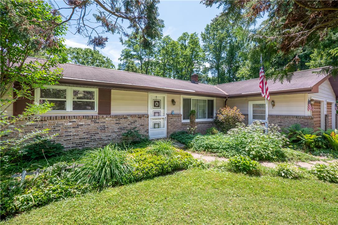5311 Macungie Mountain Road Macungie, PA 18062 - Photo 1 of 56 A classic ranch home features a brick facade and ample greenery framing the welcoming front entry.
