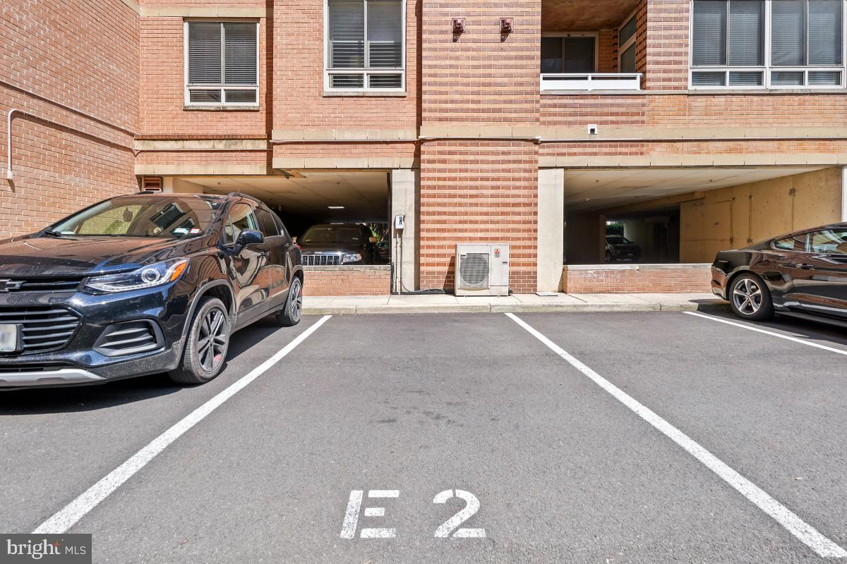 800 4th Street Southwest, Unit N301 Washington, DC 20024 - Photo 26 of 31 a car parked in front of a building