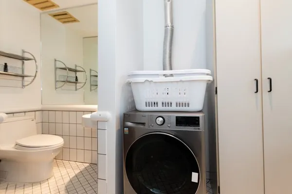 a view of bathroom with a toilet and a sink