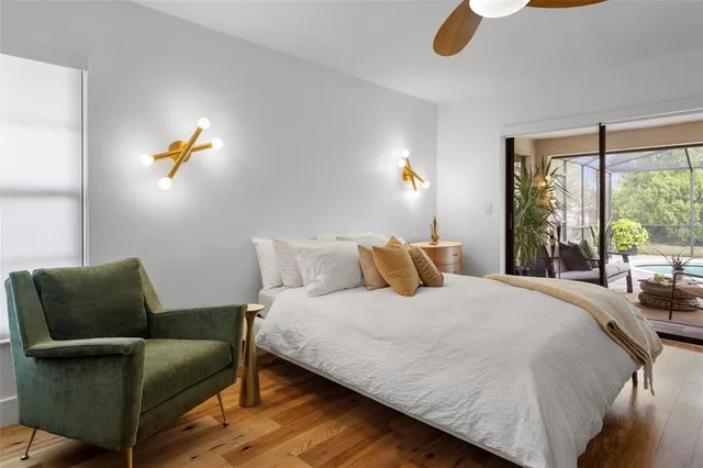 a bedroom with bed and window