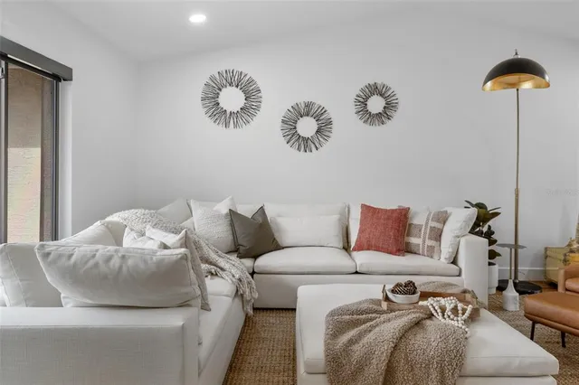 a living room with furniture and a couch