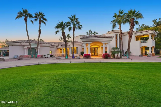 a front view of a building with garden