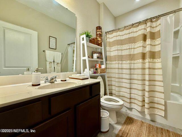 195 Torres Trace St. Augustine, FL 32095 - Photo 13 of 23 a bathroom with a double vanity sink toilet and shower