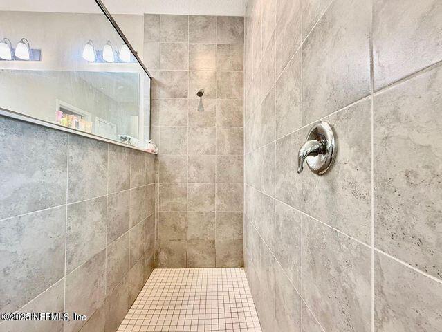 195 Torres Trace St. Augustine, FL 32095 - Photo 17 of 23 a bathroom with a shower