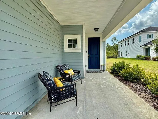 a kitchen with stainless steel appliances granite countertop sink refrigerator and microwave