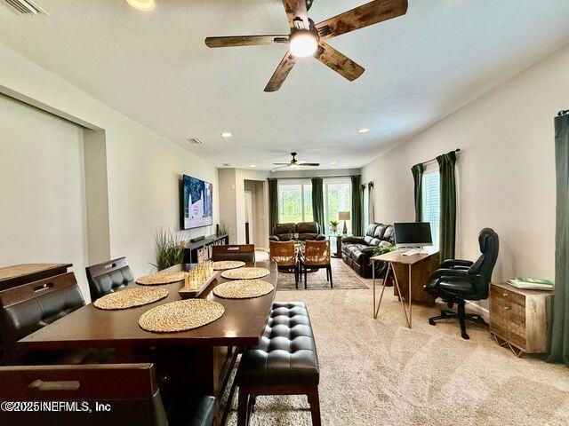 195 Torres Trace St. Augustine, FL 32095 - Photo 9 of 23 a living room with furniture a rug and a chandelier