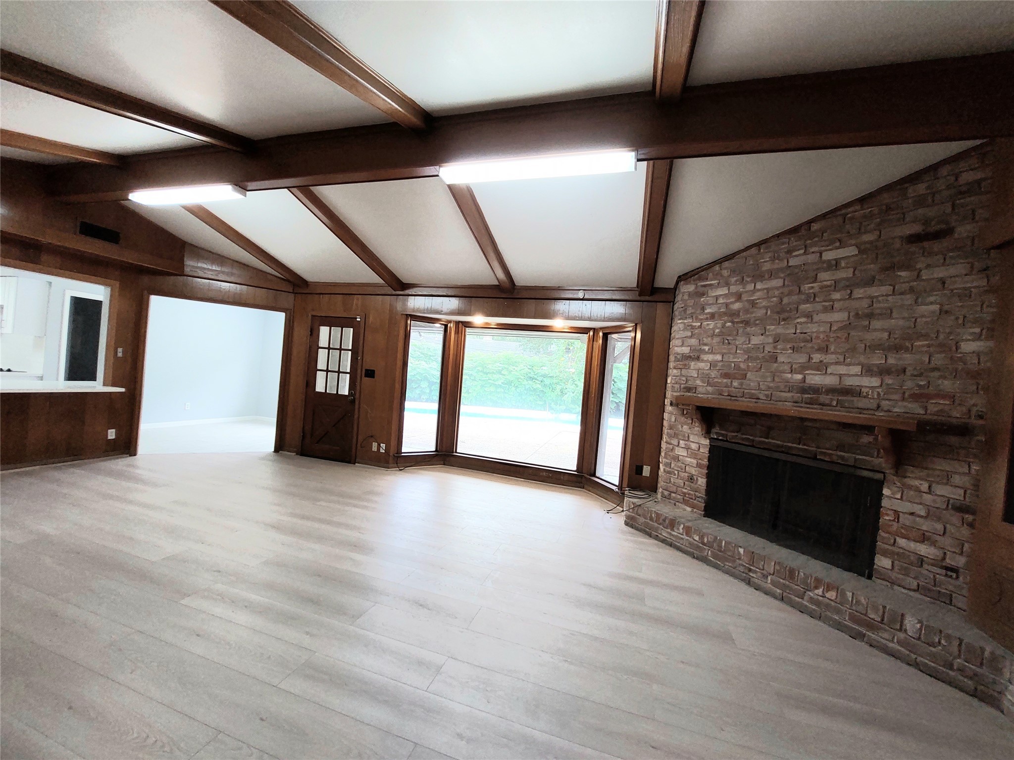 7815 Small Leaf Circle Houston, TX 77063 - Photo 4 of 28 Picture view of swimming pool backyard through bay window right besides a cozy fireplace