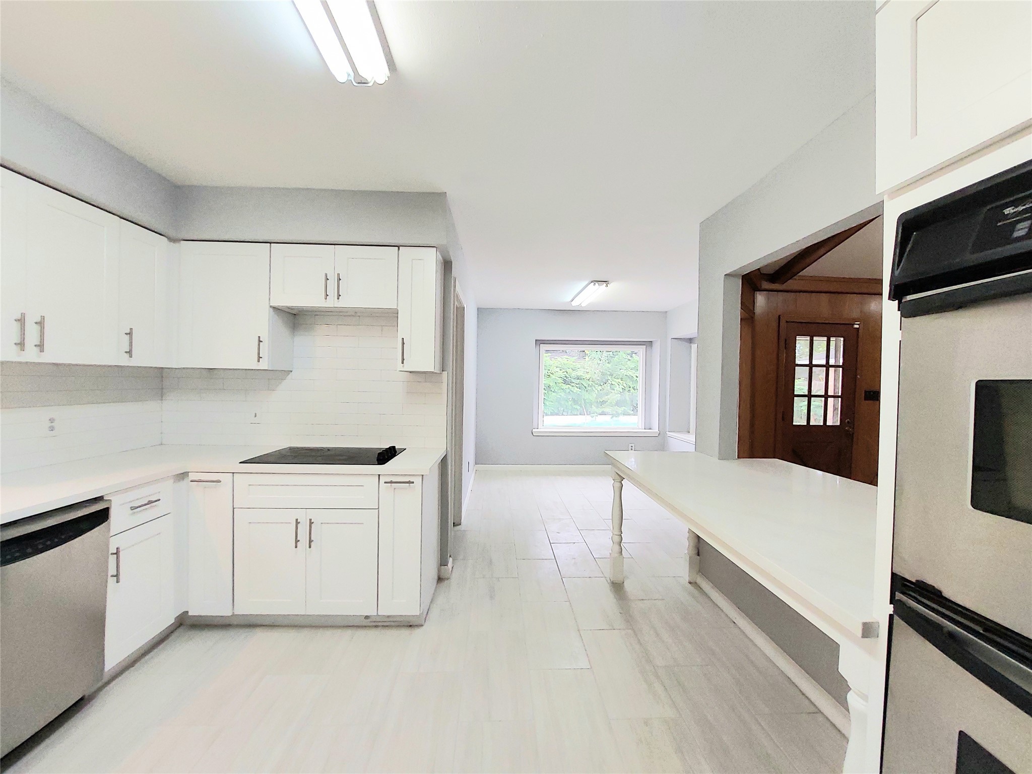 7815 Small Leaf Circle Houston, TX 77063 - Photo 8 of 28 Completely remodeled kitchen blends cooking and entertainment