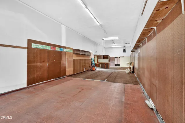 a view of a living room and garage
