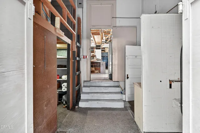 a front view of a house with two windows