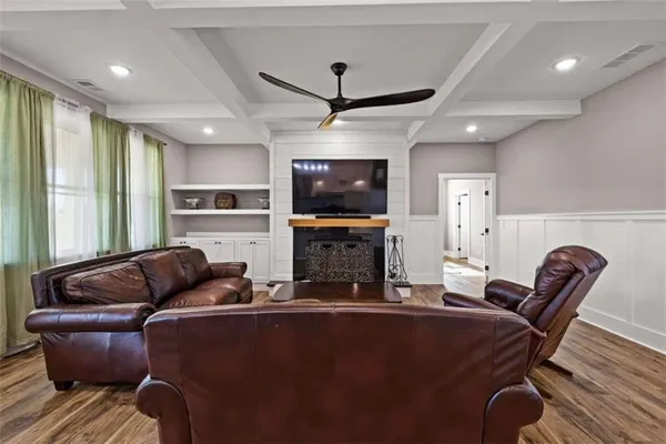 a kitchen with stainless steel appliances granite countertop a refrigerator sink and cabinets