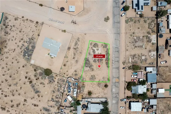 a bathroom with shower and mirror