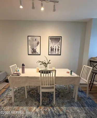 a view of a dining room with furniture