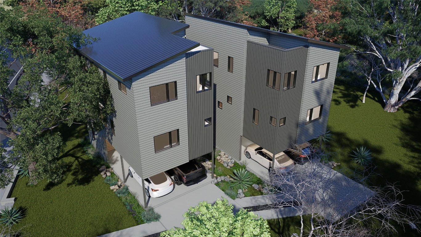 3335 East 12th Street, Unit 1 Austin, TX 78721 - Photo 10 of 12 a aerial view of a house with a yard and large tree