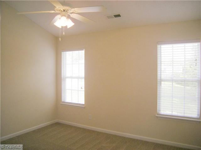 4704 Fewell Road Greensboro, NC 27405 - Photo 7 of 12 Master Bedroom. with vaulted ceiling