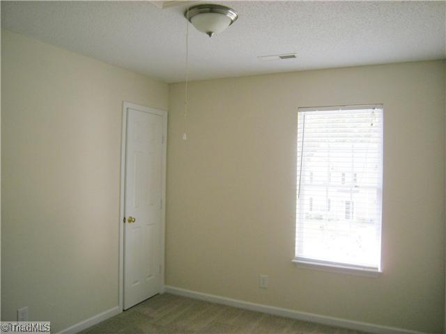4704 Fewell Road Greensboro, NC 27405 - Photo 10 of 12 1st Bedroom.