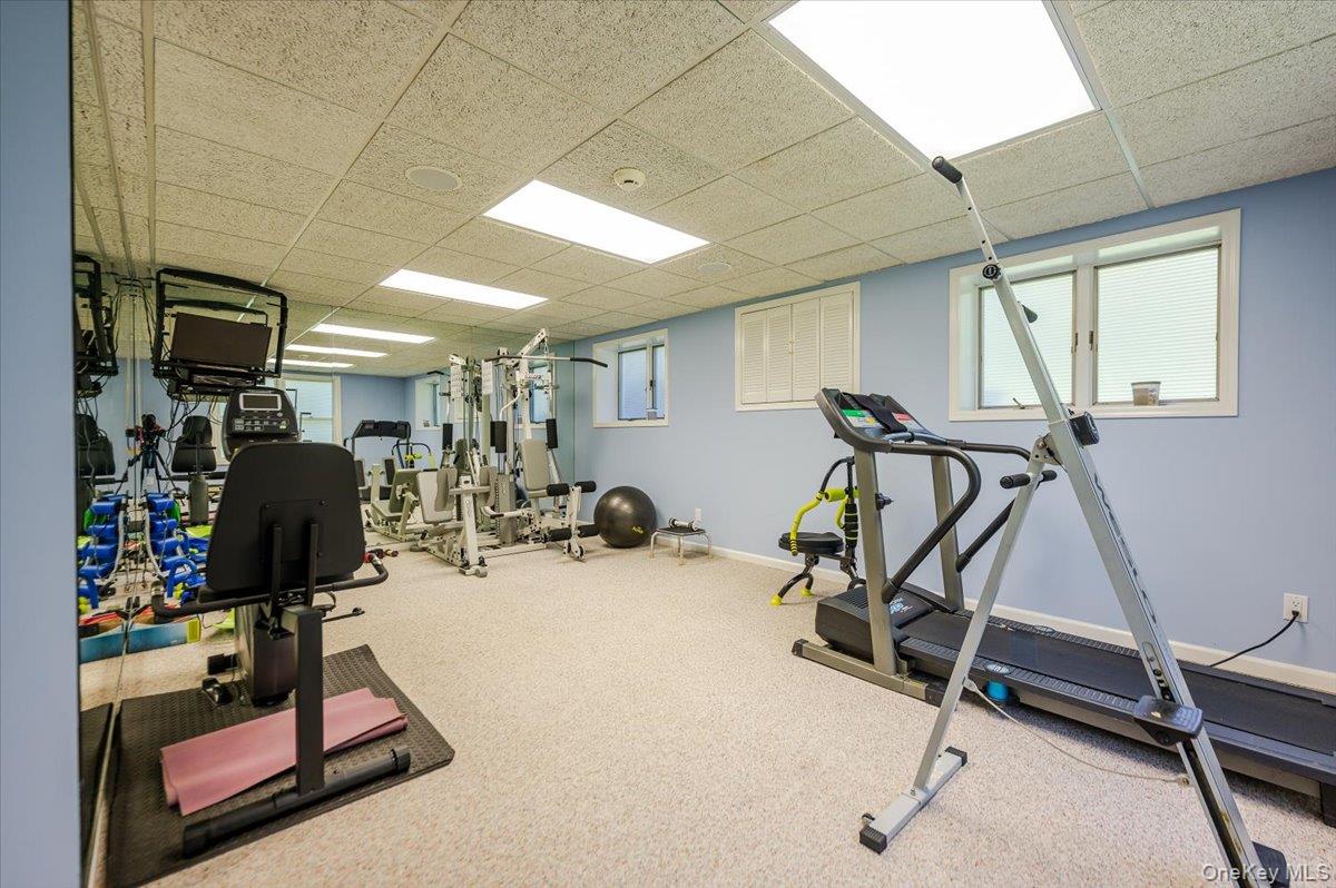 155 Jennings Road Cold Spring Harbor, NY 11724 - Photo 27 of 36 Gym with a drop ceiling
