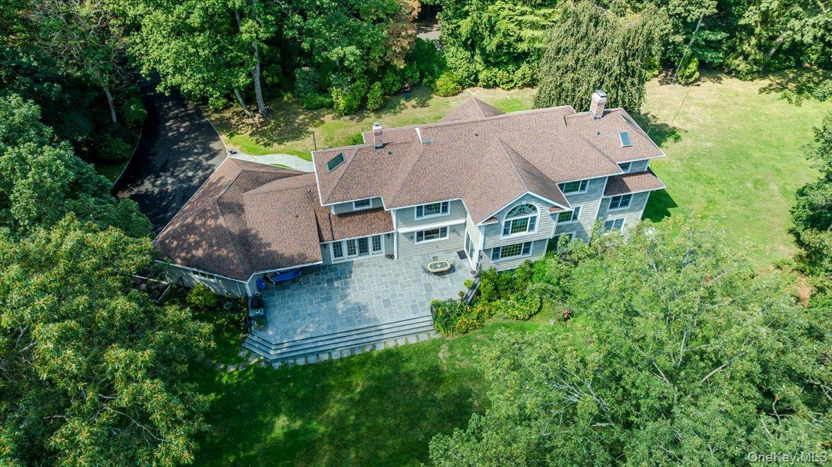 155 Jennings Road Cold Spring Harbor, NY 11724 - Photo 30 of 36 View from above of property with a tree filled landscape