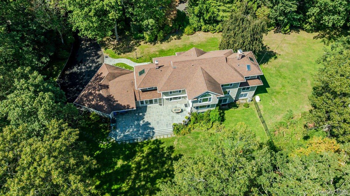 155 Jennings Road Cold Spring Harbor, NY 11724 - Photo 5 of 6 an aerial view of a house with yard swimming pool and outdoor seating