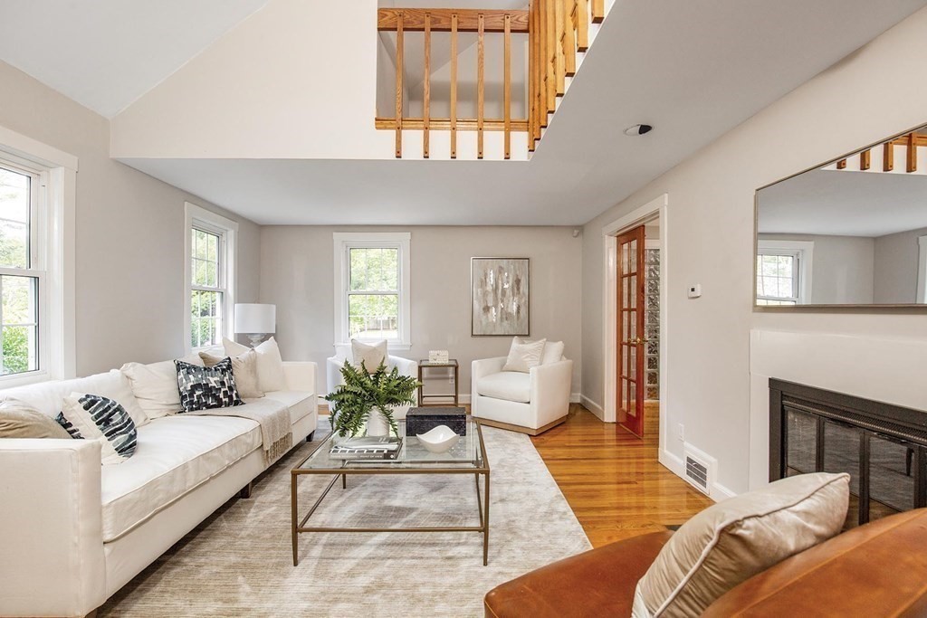 45 Haynes Road Newton, MA 02459 - Photo 2 of 12 a living room with furniture and a window