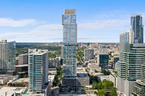a view of city with tall buildings