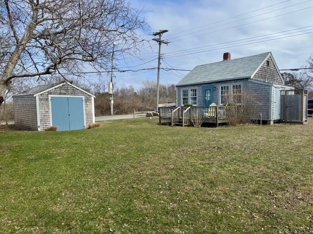 24 Washington Avenue Nantucket, MA 02554 - Photo 1 of 9 a view of a house with a yard