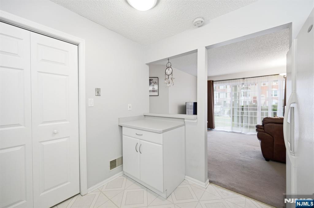 475 Quince Court Mahwah, NJ 07430 - Photo 14 of 27 a view of hallway with washer and dryer