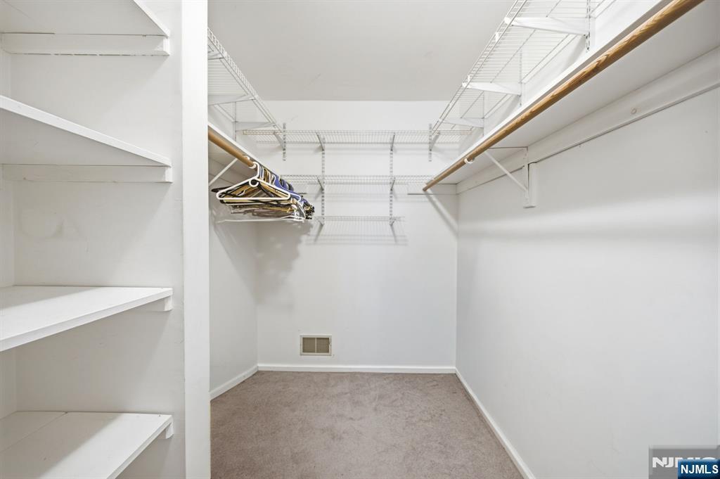 475 Quince Court Mahwah, NJ 07430 - Photo 20 of 27 a view of an empty walk in closet