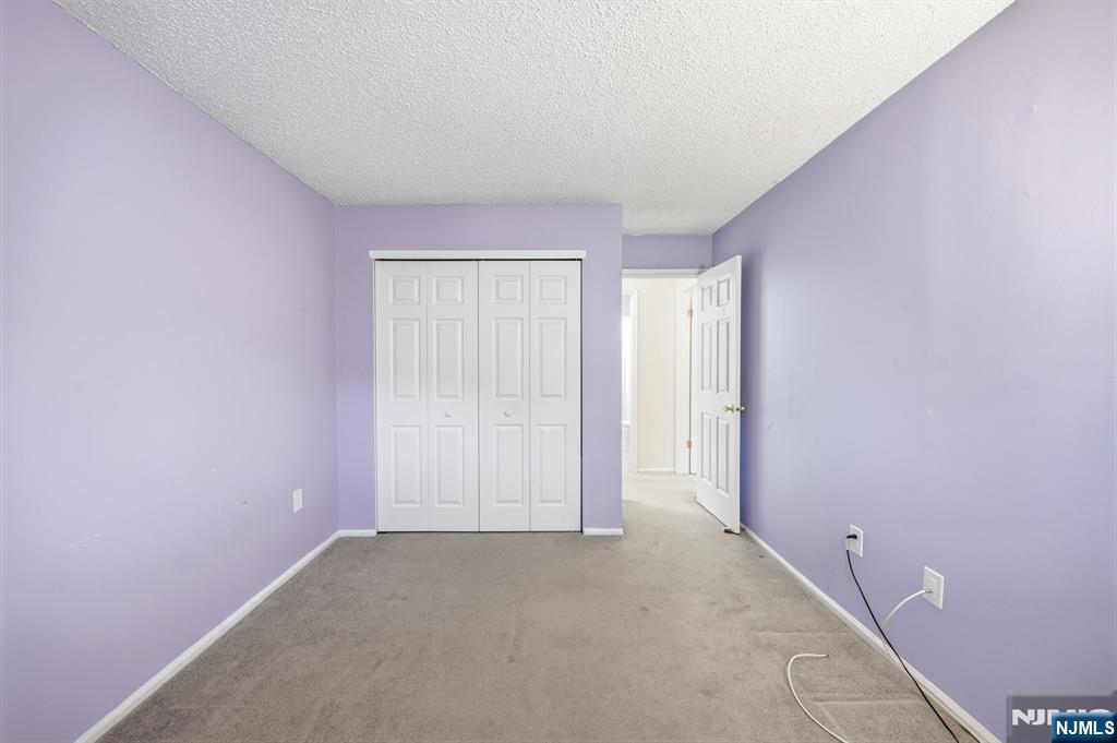 475 Quince Court Mahwah, NJ 07430 - Photo 21 of 27 an empty room with windows
