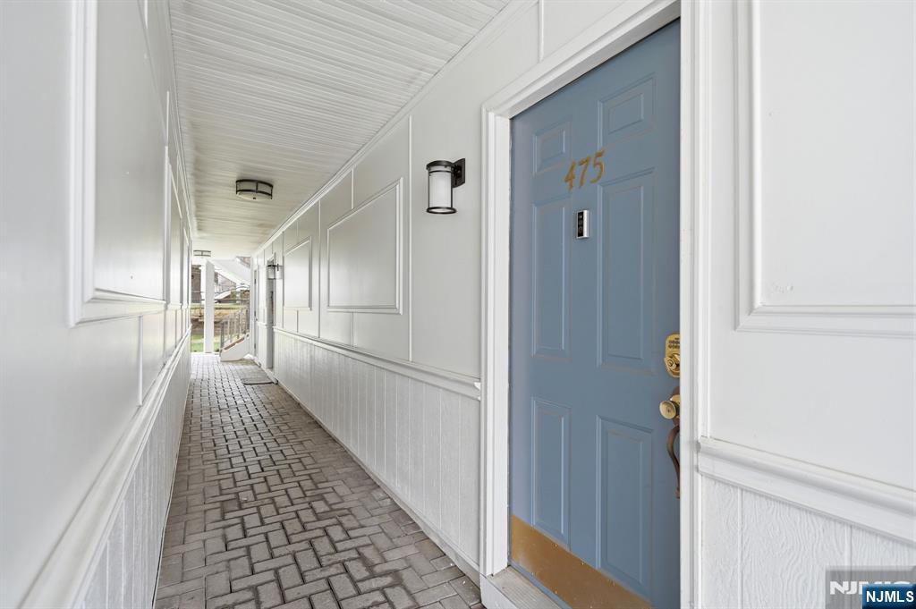 475 Quince Court Mahwah, NJ 07430 - Photo 3 of 27 a view of a hallway with wooden floor and staircase
